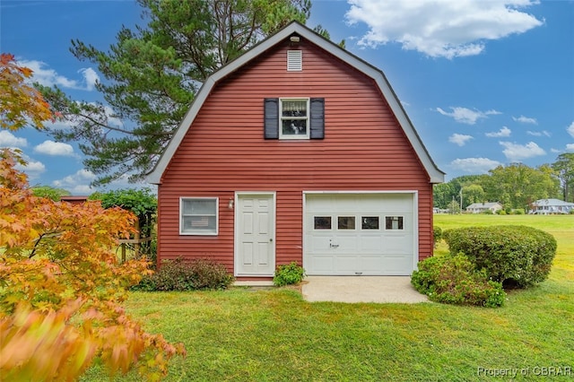 garage with a yard