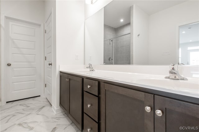 bathroom featuring vanity and a tile shower