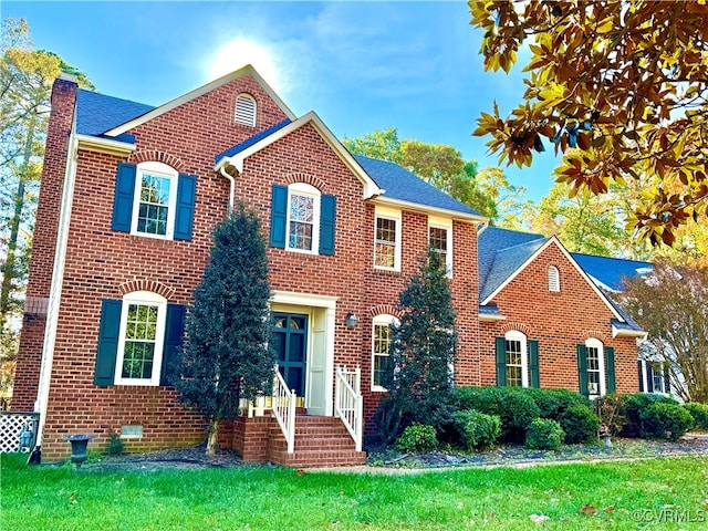 colonial house with a front lawn