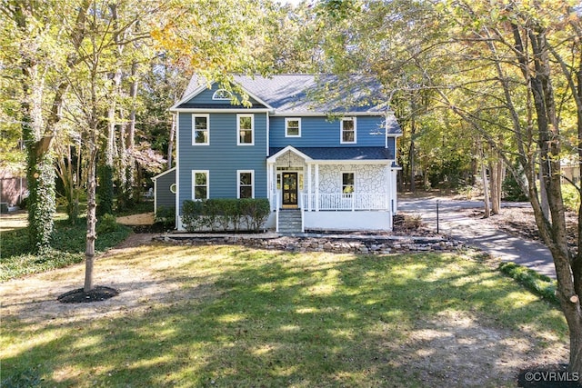 view of front of home featuring a front lawn and a porch