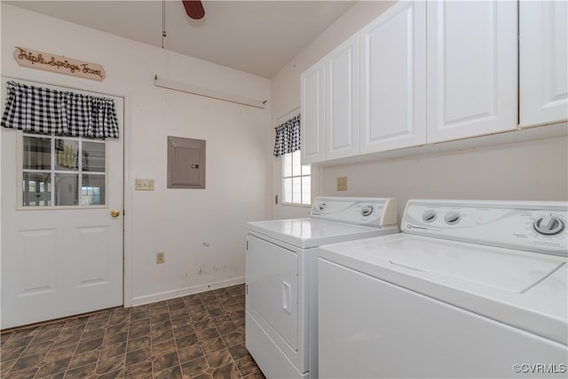 laundry area featuring electric panel, washer and clothes dryer, ceiling fan, and cabinets