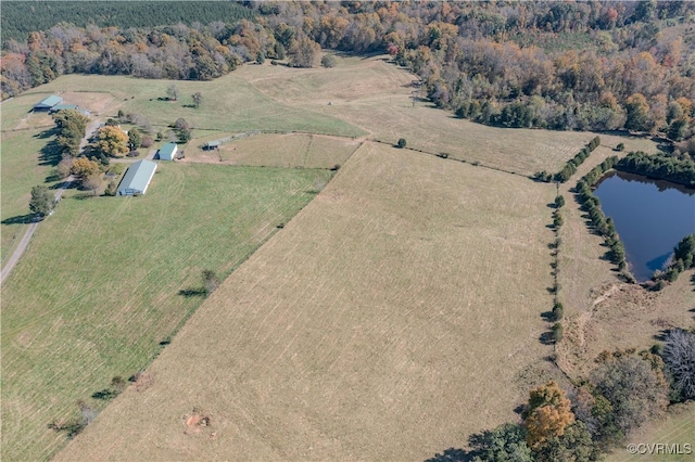 bird's eye view featuring a rural view and a water view