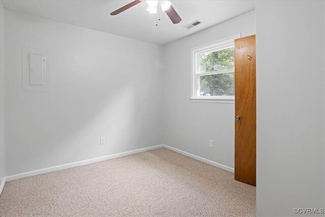 unfurnished room featuring ceiling fan and carpet floors