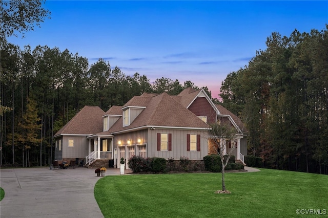 view of front of property with a yard