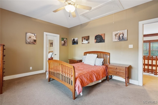 bedroom featuring ceiling fan and light colored carpet