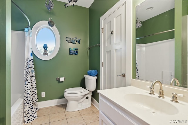 full bathroom with vanity, toilet, tile patterned floors, and shower / tub combo