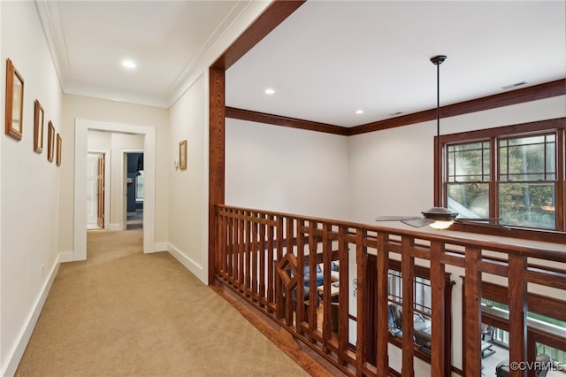 corridor with light carpet and ornamental molding