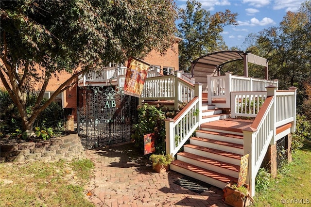 rear view of property with a deck