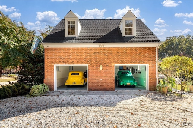 back of house with a carport