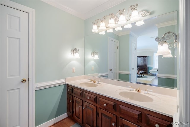 bathroom featuring vanity and ornamental molding