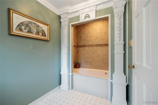 bathroom featuring ornamental molding, tiled shower / bath combo, and ornate columns