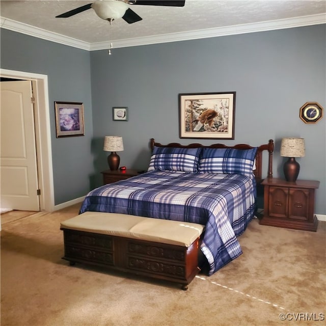 carpeted bedroom with crown molding, a textured ceiling, and ceiling fan