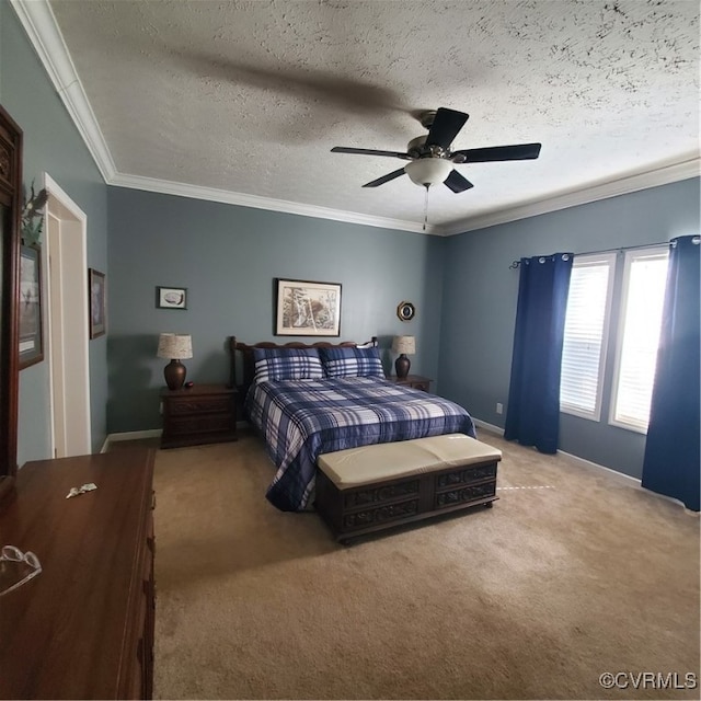 carpeted bedroom featuring ornamental molding, a textured ceiling, and ceiling fan