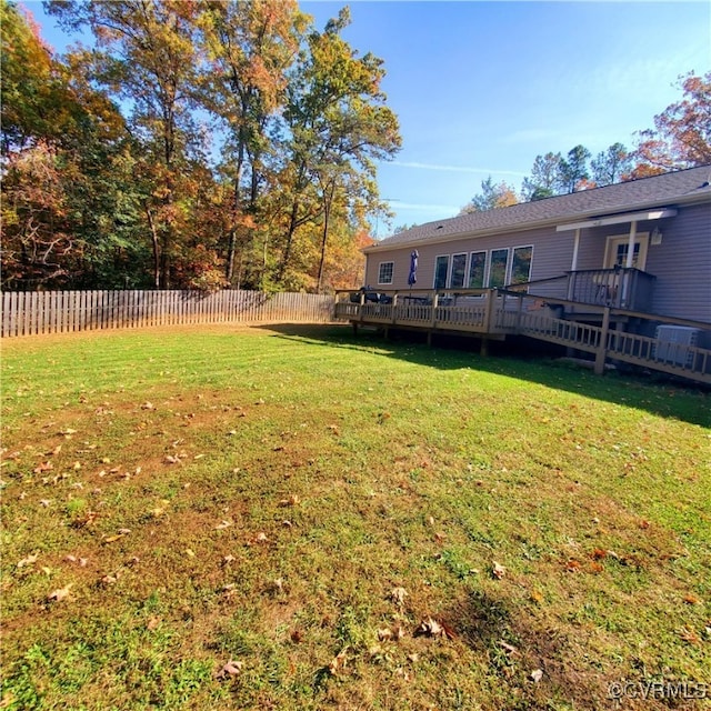 view of yard with a wooden deck