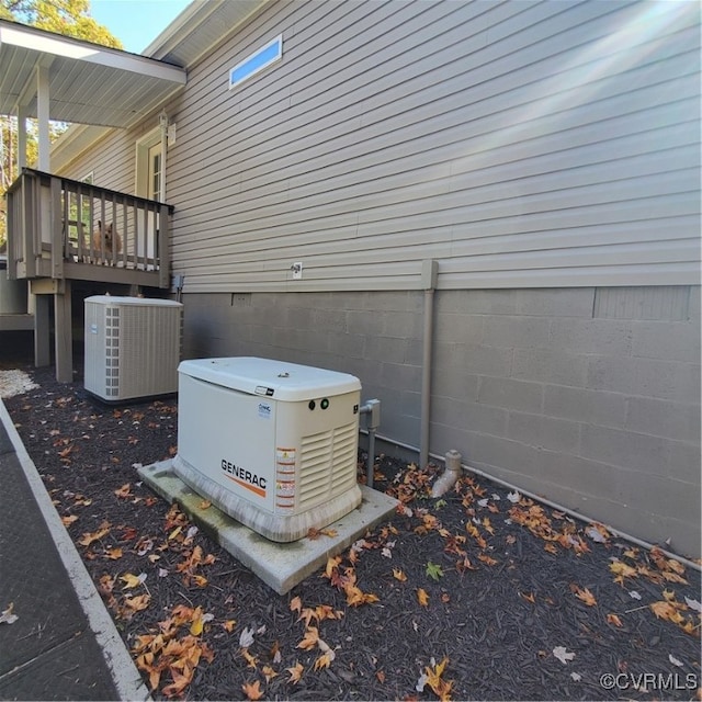 exterior details with central AC unit and a skylight