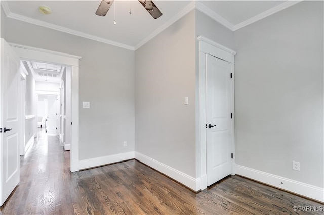 unfurnished room featuring crown molding, dark hardwood / wood-style flooring, and ceiling fan