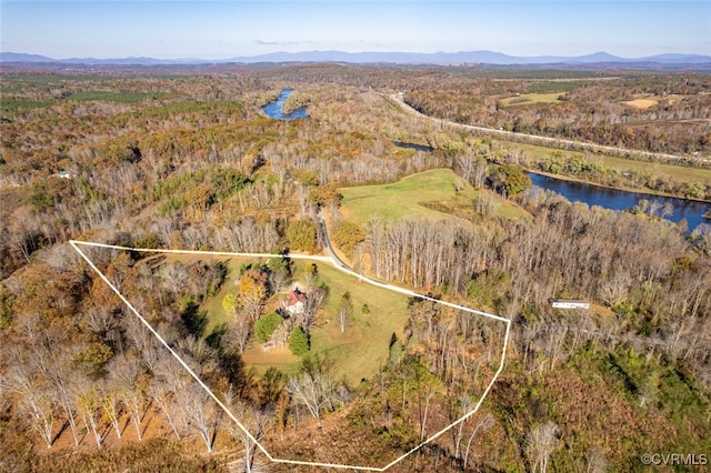 bird's eye view with a water and mountain view