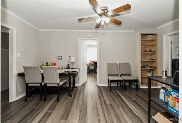 office area featuring ornamental molding, ceiling fan, and dark hardwood / wood-style flooring