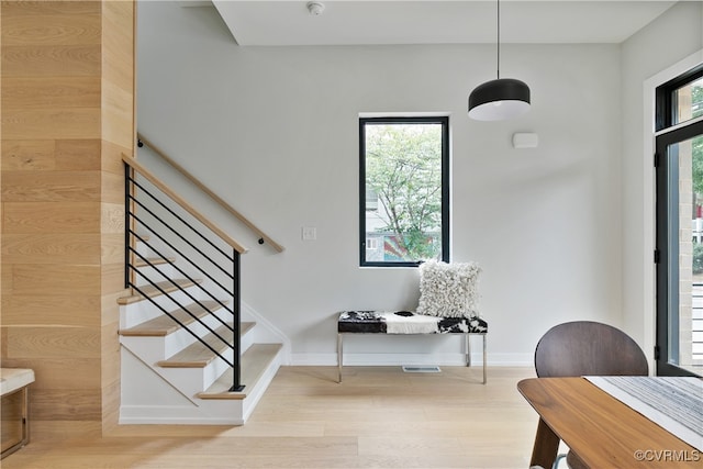 entryway with light hardwood / wood-style flooring