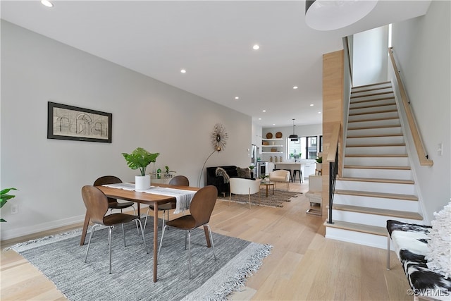 dining room with light hardwood / wood-style flooring