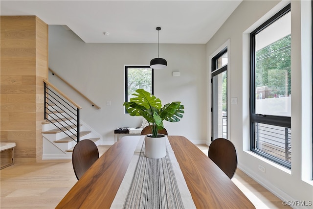 dining room with light hardwood / wood-style flooring