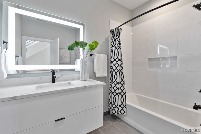 bathroom featuring vanity, shower / bath combination with curtain, and tile patterned floors