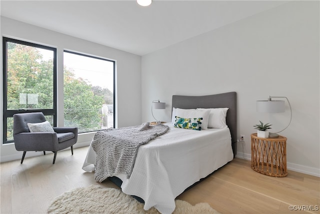 bedroom featuring wood-type flooring