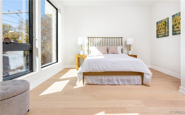 bedroom with light hardwood / wood-style flooring