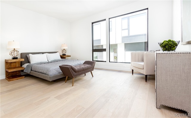 bedroom with light hardwood / wood-style floors