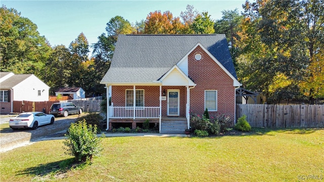 bungalow-style home featuring a front yard and a porch