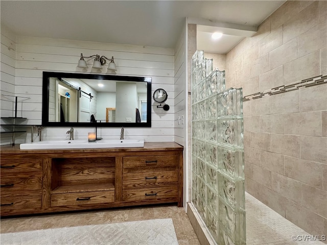 bathroom featuring vanity and a shower