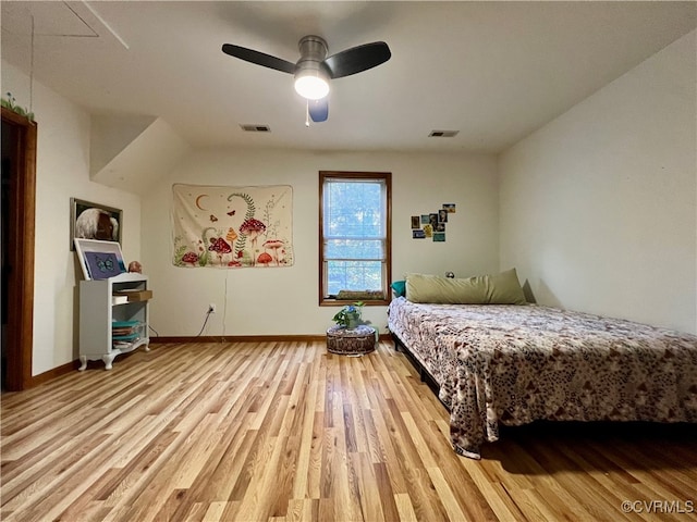 bedroom featuring ceiling fan and hardwood / wood-style flooring