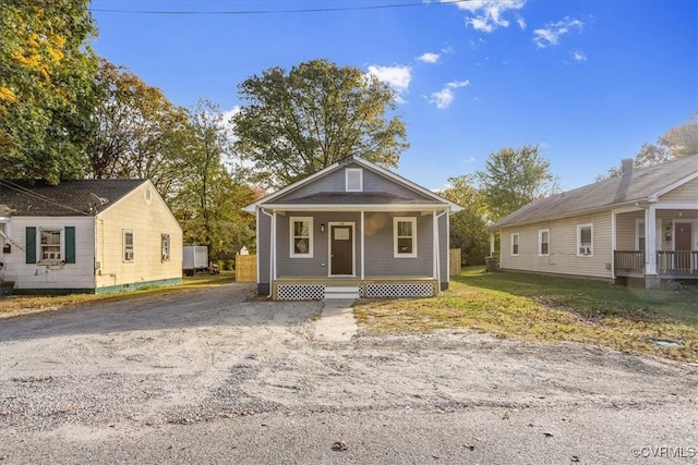 bungalow-style home with a porch