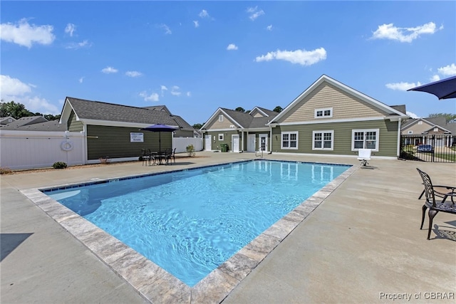 view of pool featuring a patio area