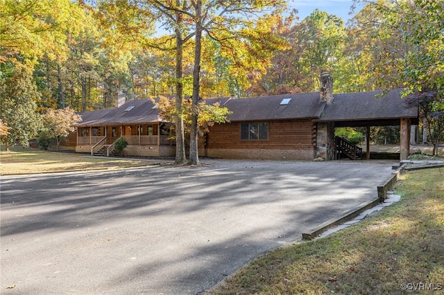 view of log cabin