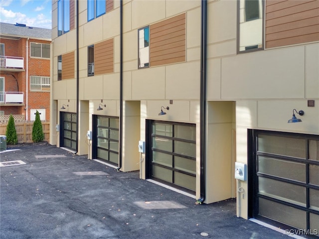 view of building exterior featuring a garage