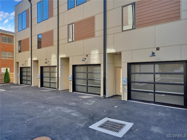 view of building exterior featuring a garage