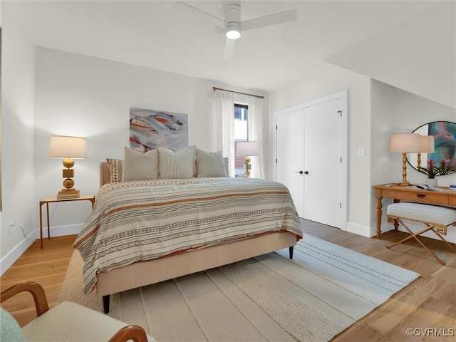 bedroom featuring ceiling fan and wood-type flooring