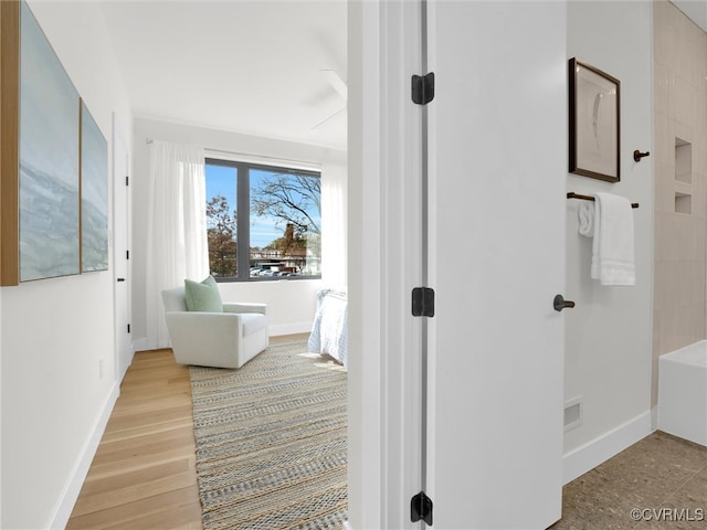 bathroom with hardwood / wood-style flooring