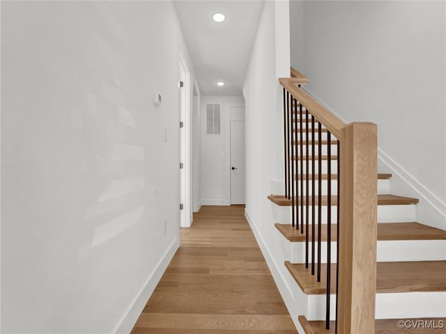 corridor featuring light hardwood / wood-style flooring