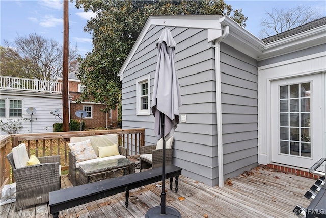 deck featuring outdoor lounge area