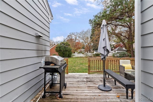 wooden deck with area for grilling