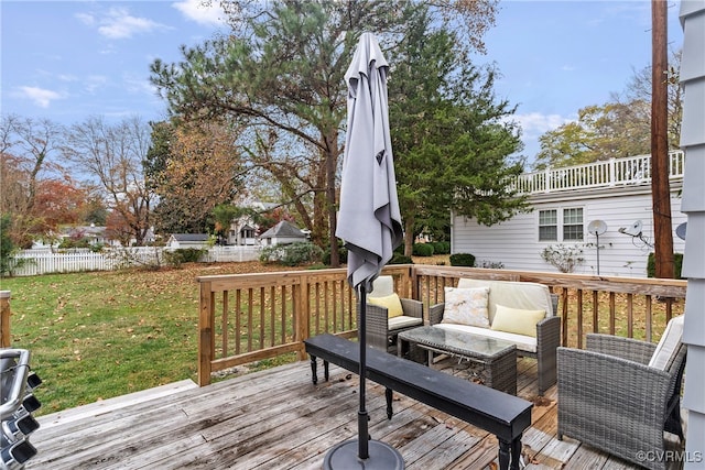 deck with a yard and an outdoor hangout area