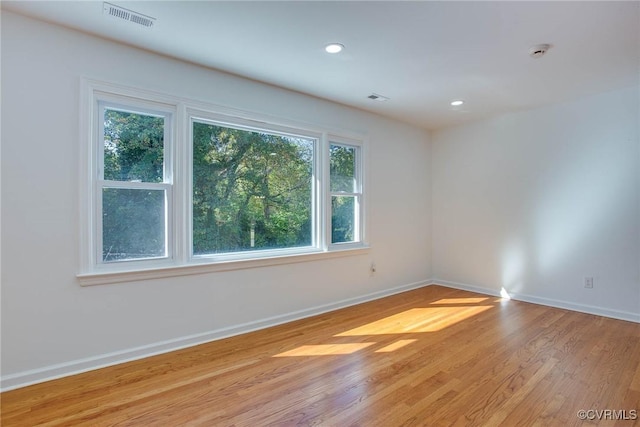 empty room with light wood-type flooring