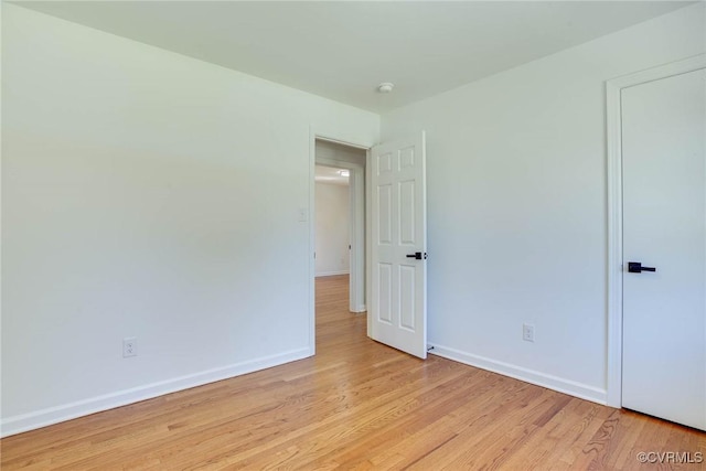 unfurnished room featuring light hardwood / wood-style floors