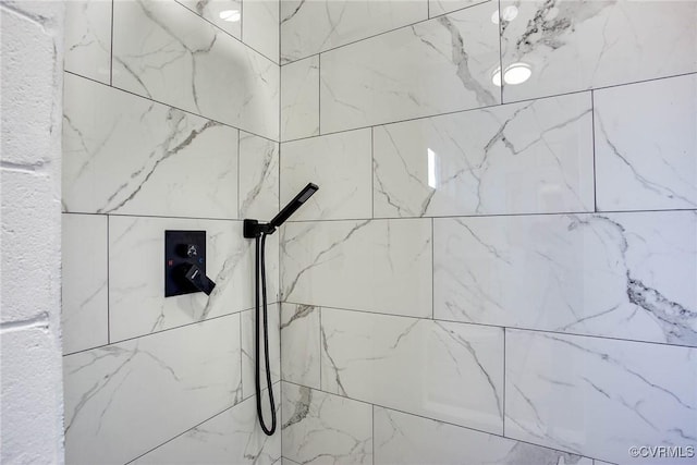 details with a tile shower