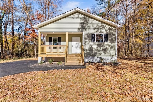 bungalow-style home featuring covered porch