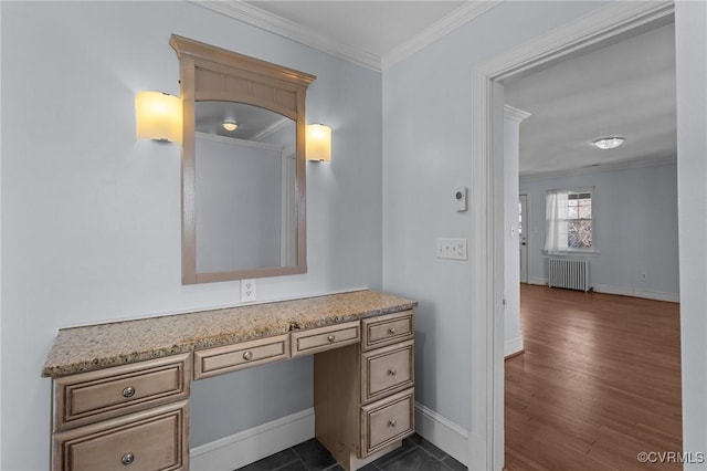 bathroom with radiator, crown molding, and wood-type flooring