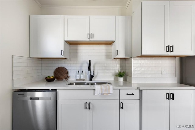 kitchen featuring dishwasher, white cabinets, crown molding, backsplash, and sink