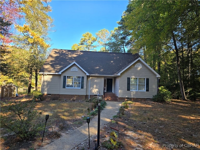 view of front of house with a shed